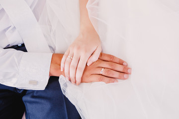 hands of bride and groom