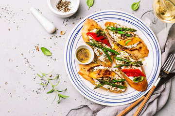 Toasts (sandwiches) with cheese, pepper and asparagus