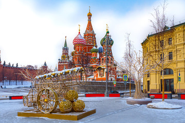Moscow. Russia. Moscow Kremlin winter holiday panorama. Spasskaya tower chimes. St. Basil's Cathedral. Winter Red Square Christmas decoration. Russian cities. Moscow architecture. Capital of Russia.