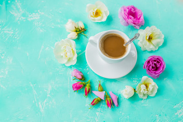 Coffee drink concept with cup of americano and roses,and petals frame.copy space.Minimal creative layout with cup of coffee, colorful roses flowers. Concept of beauty, tenderness, love, dating.