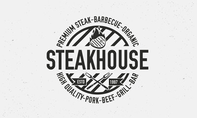 Vintage Steakhouse Logo. Steak grill retro logo template. Barbecue restaurant emblem. Vector Illustration. 