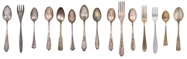 Collection vintage spoons, forks and knife isolated on a white background. Retro silverware