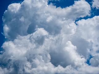 Image of blue sky abstract and fluffy white cloud during the daytime