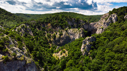 Fototapeta na wymiar Aerial view of mountain and forest by the Vratna river in Serbia