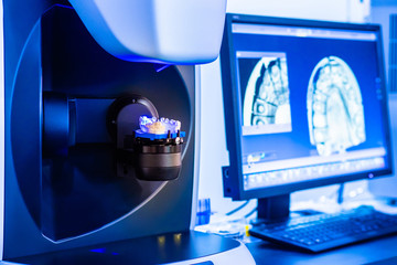 Workplace dental technician. Production of dental crowns. Milling dental system with computer...
