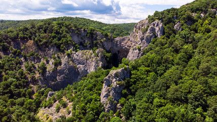 Aerial view of mountain and forest by the Vratna river in Serbia