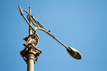 Vintage lantern on the background of a clear blue sky, Naples, Italy