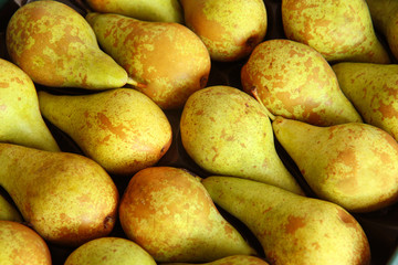 fresh pears as background, top view