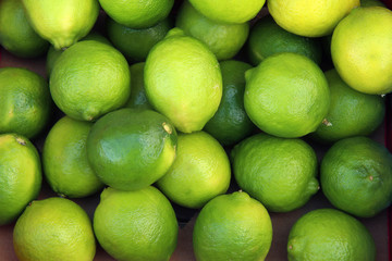 fresh green limes and lemons