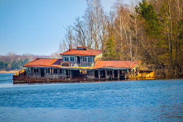 dilapidated and abandoned house boat in chernobyl