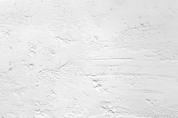 Neutral white colored low contrast Concrete textured background with roughness and irregularities to your concept or product.