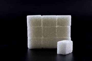 Sugar cubes were arranged in square shape.