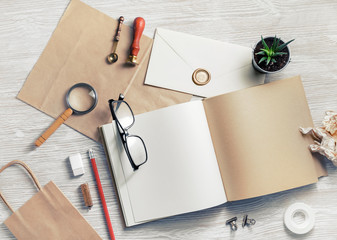Blank retro stationery set on light wooden background. Branding ID mock up. Flat lay.