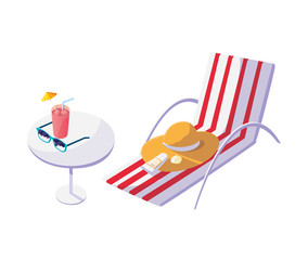 summer beach chair with hat and cocktail