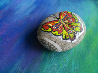 butterfly round stone pattern nature bright color blue green background pastel abstract pattern colored dots
