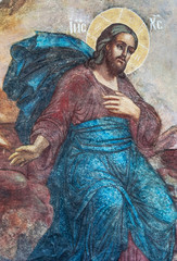 Verical fragment of the mural painting of Jesus Christ in Tolga Monastery