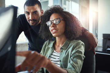 Two business colleagues working together in office