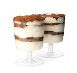 Two glasses of tiramisu cake isolated on white