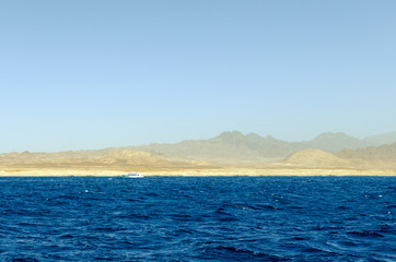 Mountain landscape with blue water in the national park Ras Mohammed, Egypt.