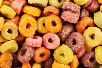 Close up on delicious fruit cereal loops flavorful, funny addition to kids breakfast.