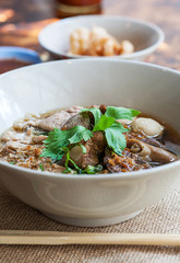 THAI BOAT NOODLE SOUP or KUAYTIAW REUA This delicious Thai noodle soup Local food in Thailand that can be eaten in general is delicious and cheap, Braised pork noodles,Thai food, Selective focus