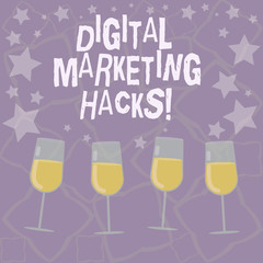 Writing note showing Digital Marketing Hacks. Business photo showcasing Using skills or system hacking to generate leads Filled Cocktail Wine Glasses with Scattered Stars as Confetti Stemware