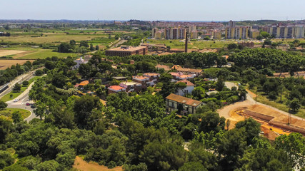 Fototapeta na wymiar Barcelona. Aerial view in Santa Coloma de Cervello, Colonia Guell.Spain Drone Photo