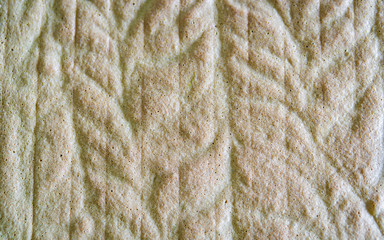 Baked brown green sponge cake texture.