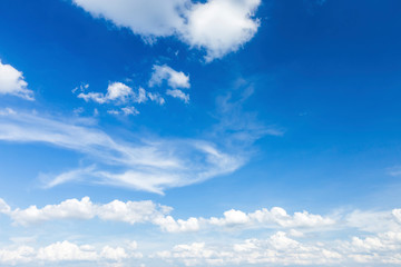 Naklejka na ściany i meble blue sky background texture with white clouds.