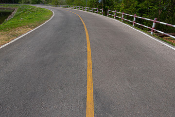 Rural road with stiles marking lines white stripes texture Background.