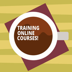 Text sign showing Training Online Courses. Conceptual photo deliver a series of lessons to a web browser Top View of Drinking Cup Filled with Beverage on Color Paper photo