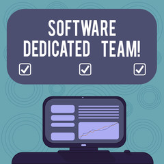 Conceptual hand writing showing Software Dedicated Team. Business photo showcasing business approach to app and web development Mounted Computer Screen with Line Graph on Desk Text Box