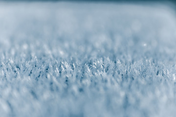 Obraz premium Winter background, frost, ice crystals close up