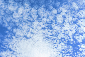 Beautiful white fluffy clouds with blue sky background. Nature weather, the vast cloud blue sky.