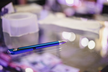 Pen on the glass cabinet