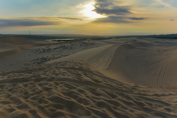 Sand dunes at sunset