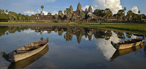 Panoramas of Angkor Wat reflection in lotus pond with two boat on evening, Siem Reap, Cambodia © ANUCHID