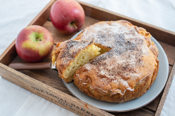home made sweet apple pie with red apples