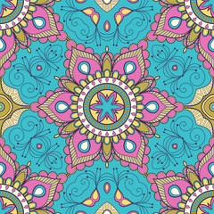 Decorative colorful ethnic seamless pattern for fabric or wrapping in oriental style. Hand drawn illustration