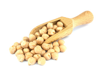 Small wooden scoop  with chickpeas seen isolated on white background