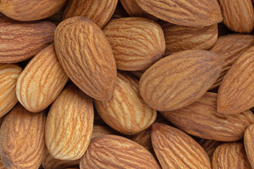 close up of raw shelled almonds