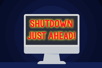 Text sign showing Shutdown Just Ahead. Business photo text closing factory business either short time or forever Blank Space Desktop Computer Colorful Monitor Screen Freestanding on Table