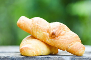 freshly baked croissants / Bakery bread on wood table homemade breakfast food