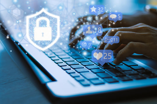 Businesswoman working in the at the office with safety systems that fasten. Business, Technology, security Internet and network concept.  - Powered by Adobe