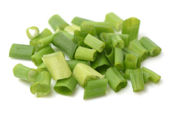 chopped spring onion or scallion isolated on white background cutout