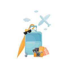 Modern blue closed suitcase on wheels. Vector illustration on white background.