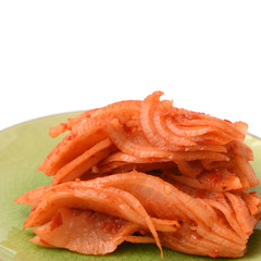 sliced radish kimchi  on white background