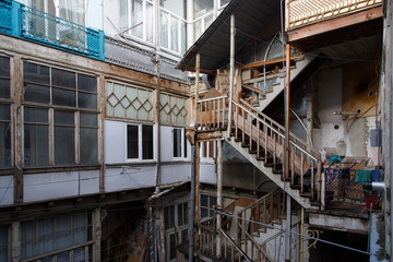 walks on streets of old Tbilisi.TBILISI, GEORGIA.Traditional georgian architecture of old houses.