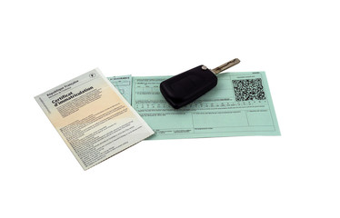 Insurance card with registration card and car ignition key