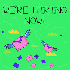 Conceptual hand writing showing We Re Hiring Now. Concept meaning recently employ someone or pay someone to do particular job Colorful Airmail Letter Envelopes and Two of Them with Wings